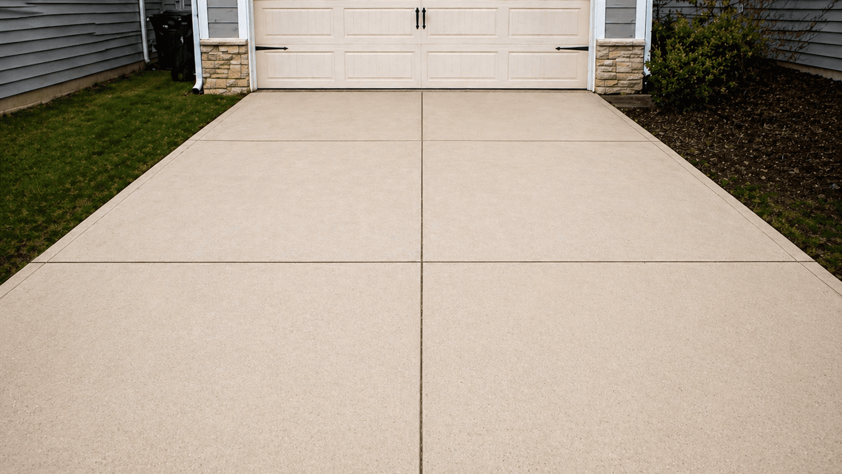 Driveway Pressure Wash after — Clean, restored surface